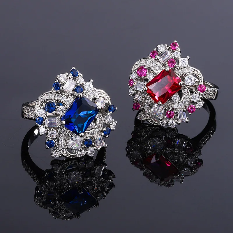 

Jewelry New European and American Royal Blue Sapphire Ring for Women Luxurious Inlaid Red Zircon Ring
