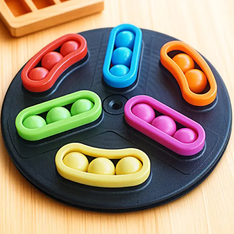 

Настольная развивающая игра-головоломка с вращающимися элементами для детей: развитие когнитивных навыков и координации рук и глаз