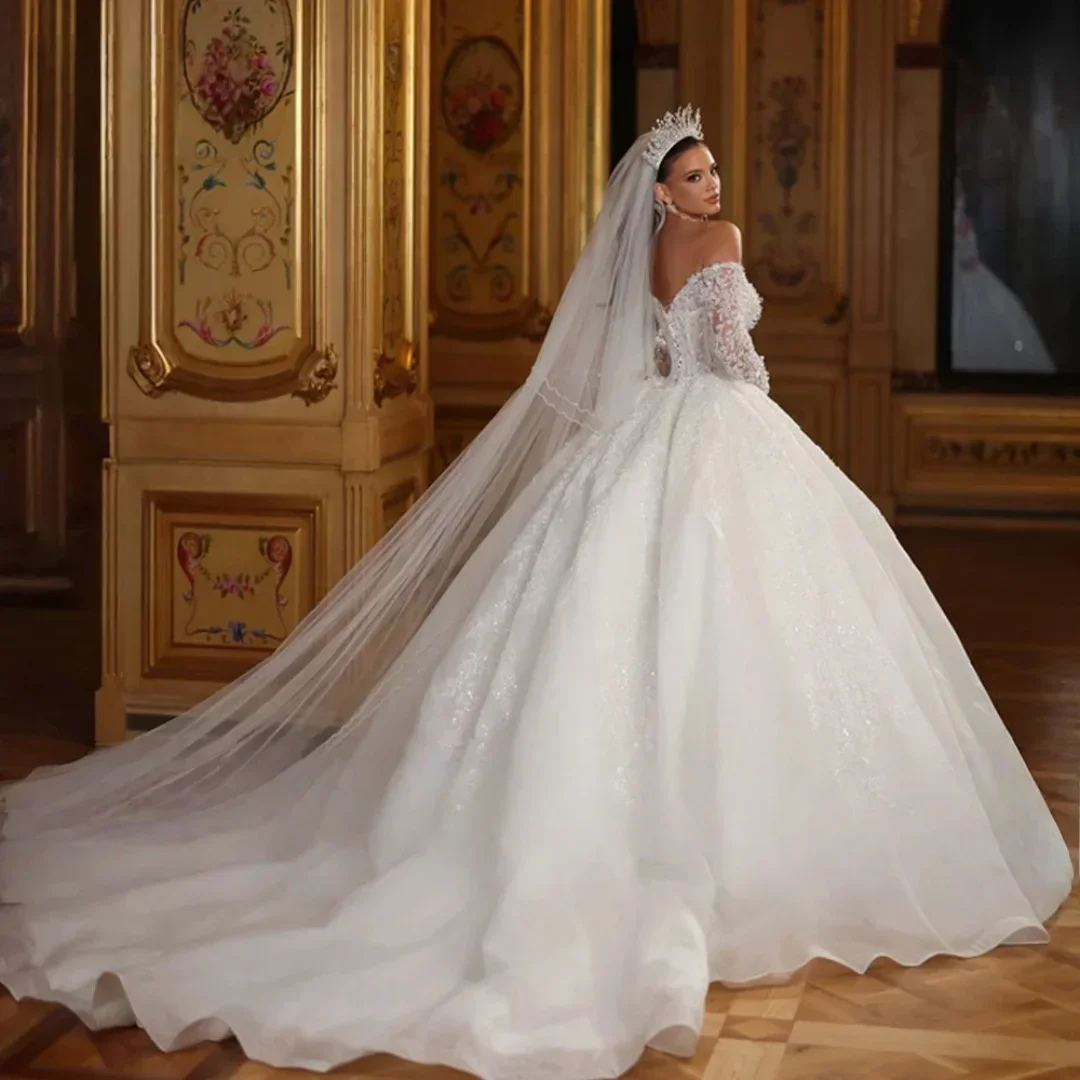 فساتين زفاف الأميرة الأنيقة المخصصة على شكل قلب قبالة الكتف واللؤلؤ والدانتيل مزين بثوب الزفاف ذيل فيستدوس دي نوفيا