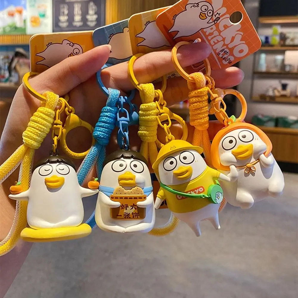 

Car Ornament 3D Little Liu Duck Keychain Wacky Cute Schoolbag Pendant Cartoon Eating Cake Key Ring Charm Gift