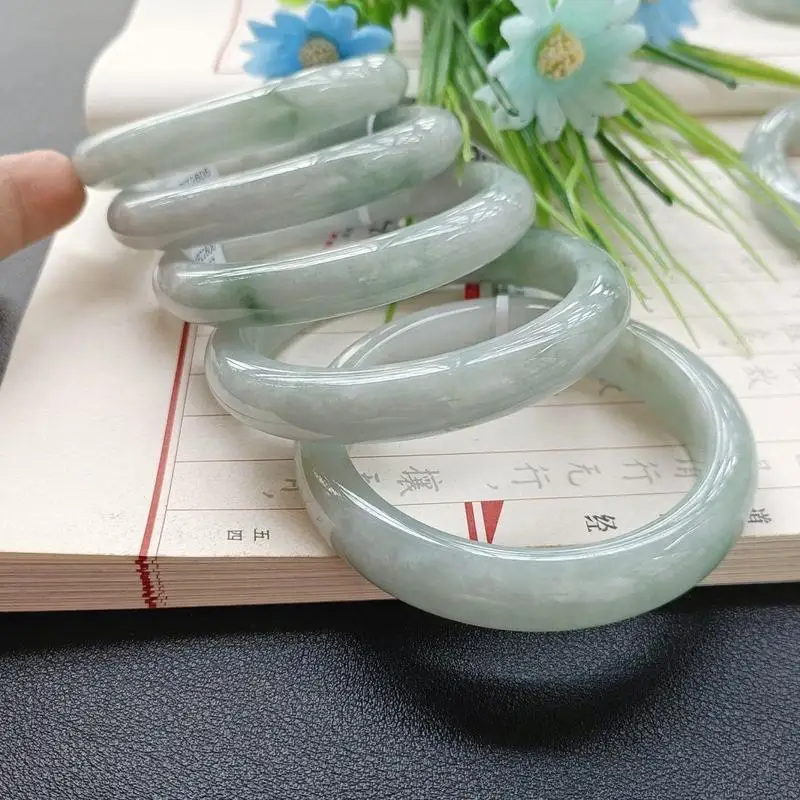 Green jade bracelet, jadeite is soft and translucent with a smooth, watery texture