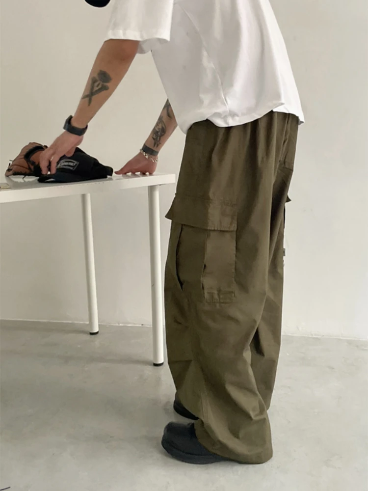 Pantalones Cargo para hombre, informales, sueltos, diarios, primavera y otoño, con múltiples bolsillos, ropa de calle de moda, estilo japonés, liso, combina con todo, Simple