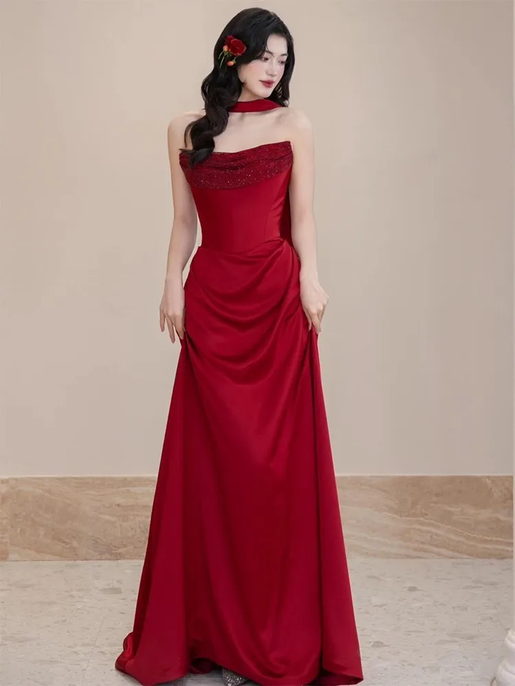 

A new off-the-shoulder unique and elegant morning dress in wine red for toasting