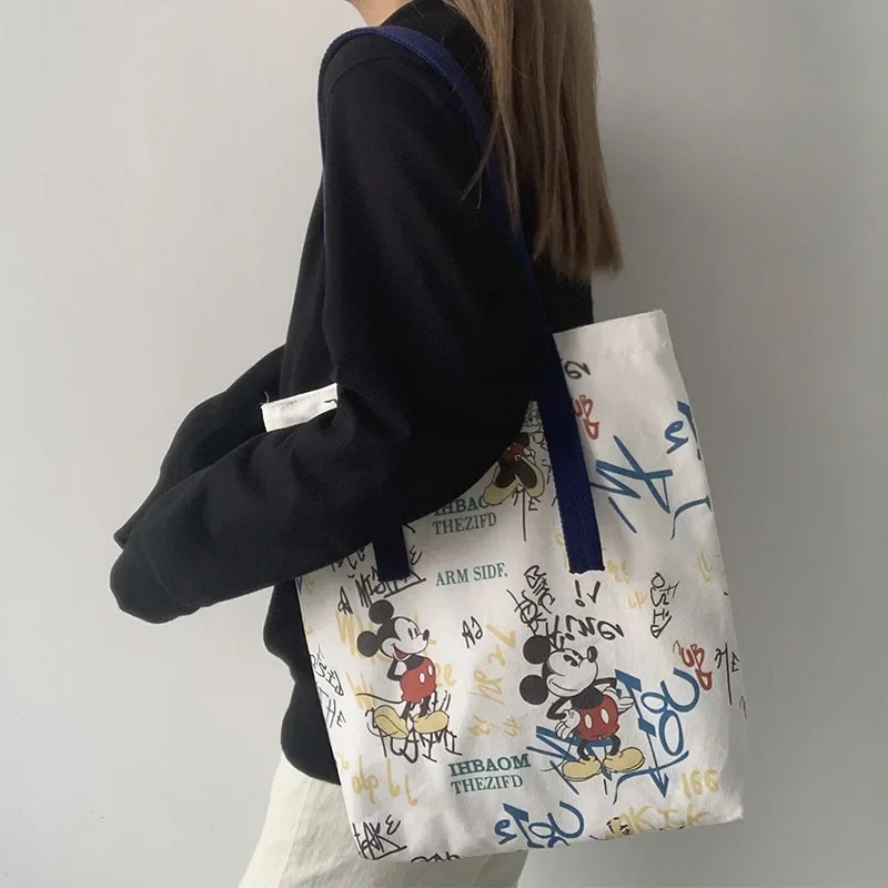 Disney cartoon płócienna torba damska na jedno ramię nowa Mickey Tote studenckie graffiti duża pojemność mała torebka torby Crossbody