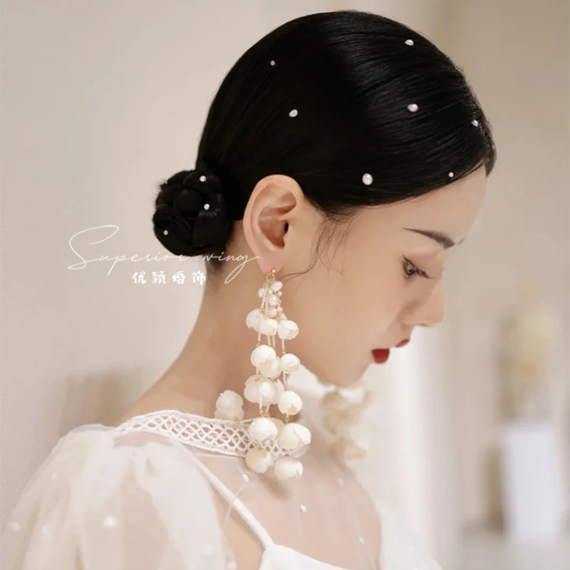 Korean gentle senior sense exquisite Lily of the valley bud handmade white tassel extra long flower earring bridal accessories