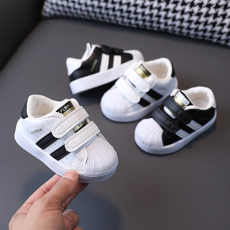 

2025 New Fashion Baby First Walk Sneakers White Non-slip Casual Sneakers Boys Girls Breathable Outdoor Infant Tennis Toddler