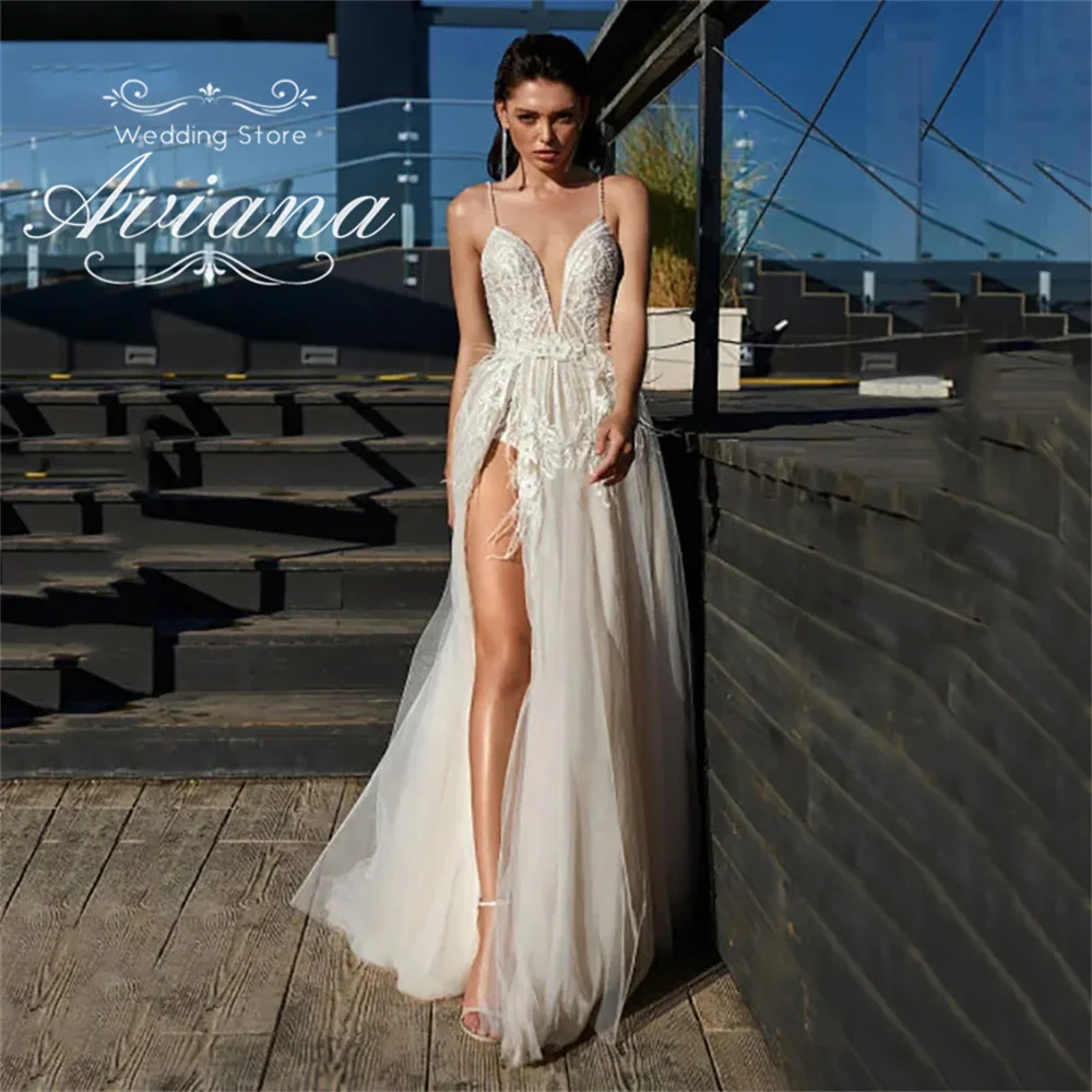 

Aviana Customized Spaghetti Straps High Side Split Deep V-Neck Wedding Dress Applique A-Line Lace Sweep Train Charming Beach