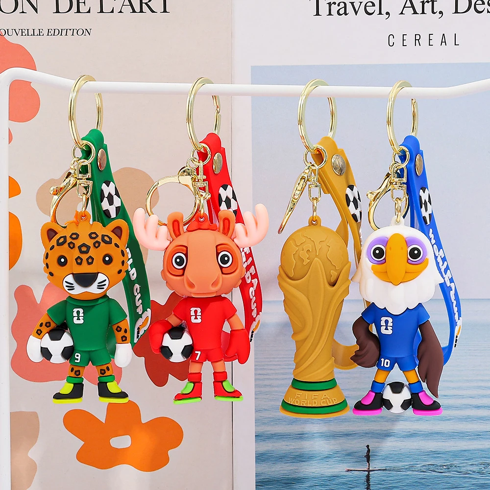 2026 Nuovo calcio IP mascotte squadra di calcio figura in PVC borsa fascino partita di calcio portachiavi souvenir per bambini e fan di Natale