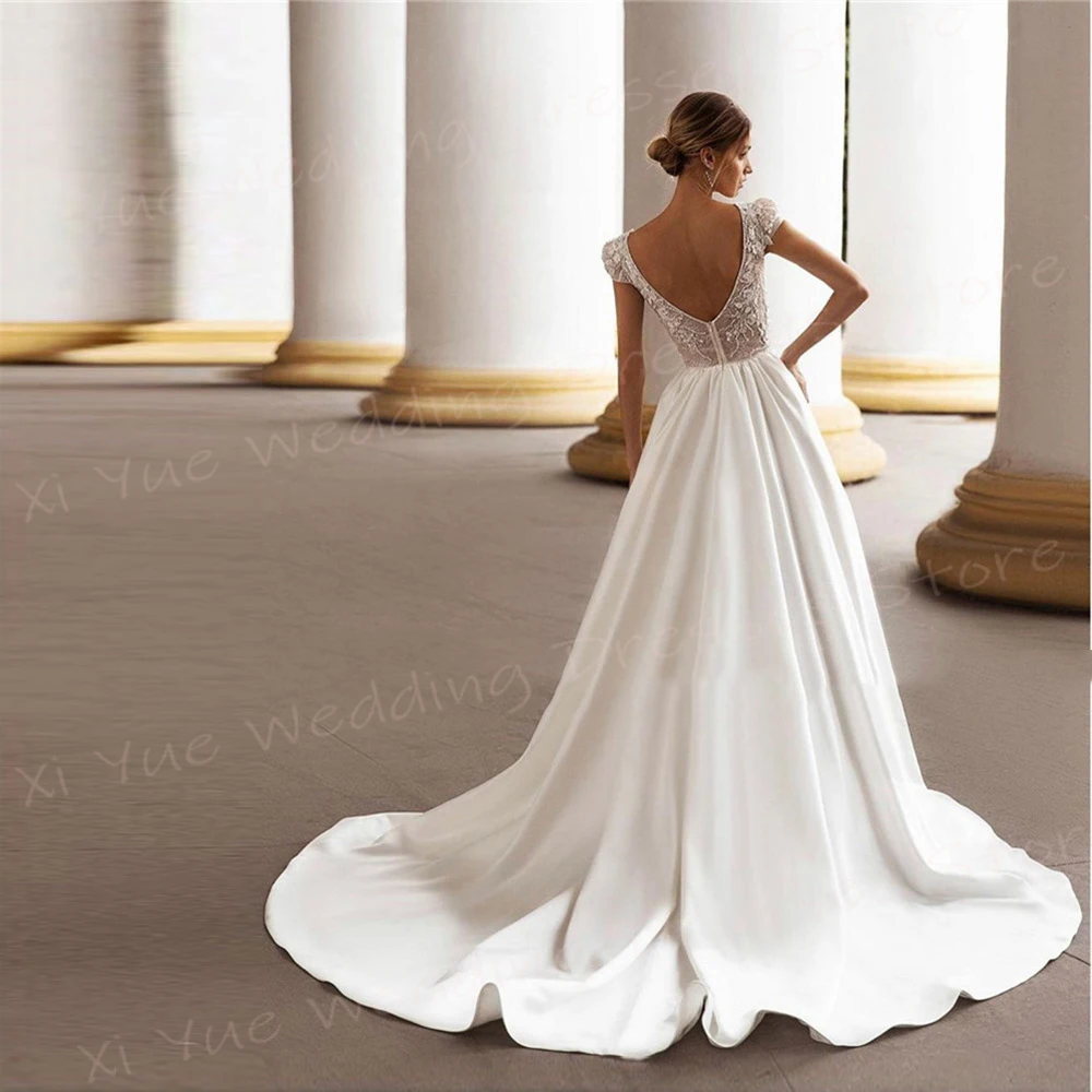 Gaun pernikahan wanita Modern elegan gaun pengantin lengan topi renda applique A-Line indah gaun pengantin Backless Vestidos De Novia Lujo