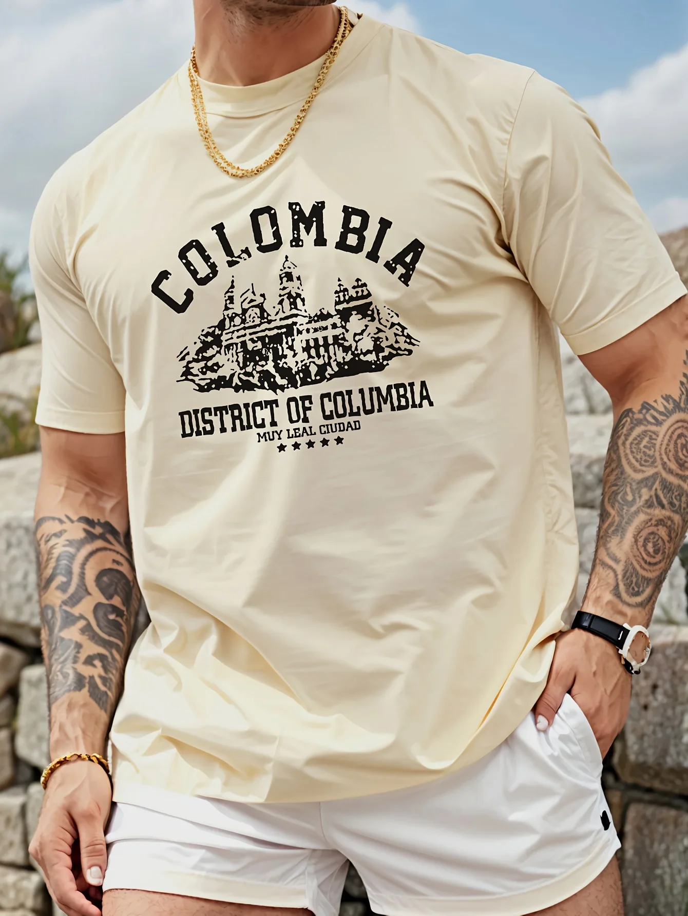 Camiseta de manga corta con cuello redondo y estampado de letras arquitectónicas colombianas holgadas informales a la moda de algodón puro 100% de verano para hombre