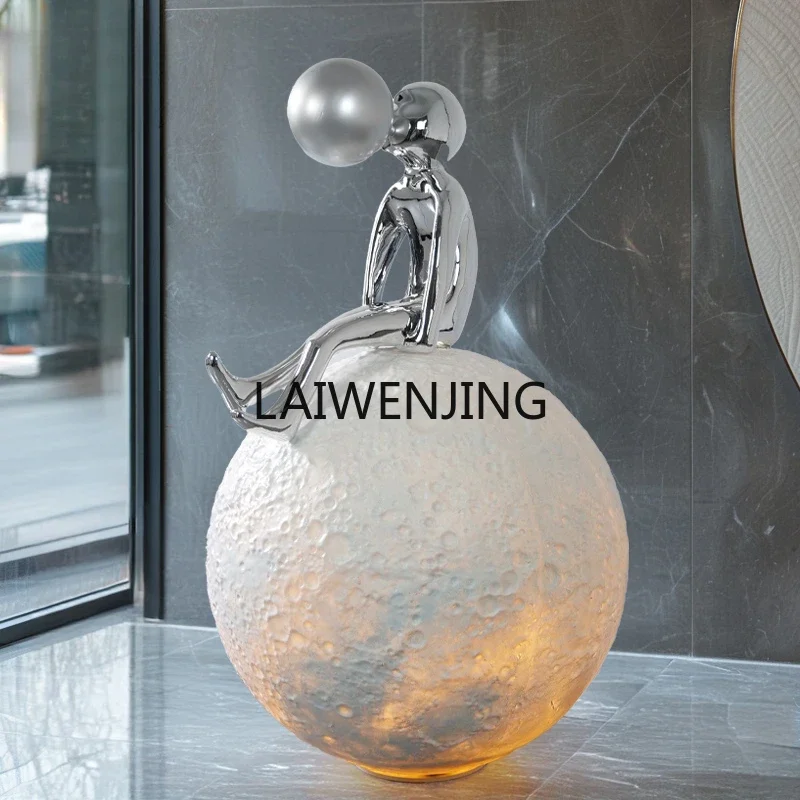 Floor-to-ceiling ornaments under SGF stairs Entrance Moon blowing bubble figure sculpture