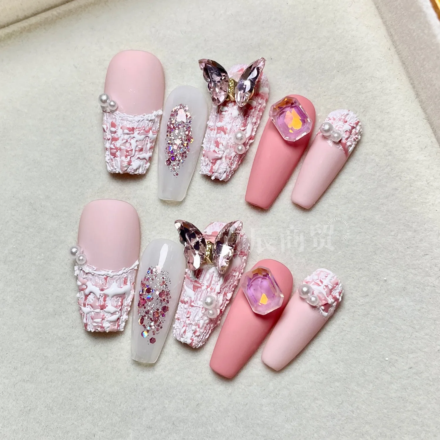 

Butterfly Xiaoxiangfeng wears pink manicure, handmade phototherapy nails, fake nail stickers, whitening and slender hands