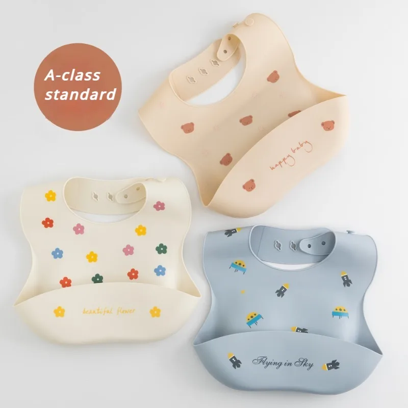 Babero de silicona impermeable con estampado de dibujos animados para bebé, babero ajustable para niño y niña, artículos de alimentación, vajilla,