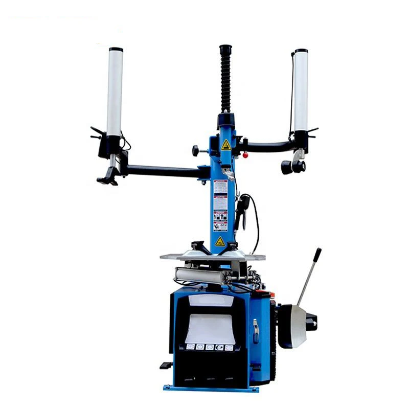 

Fully automatic backward tilt tire changer and wheel balancer for changers