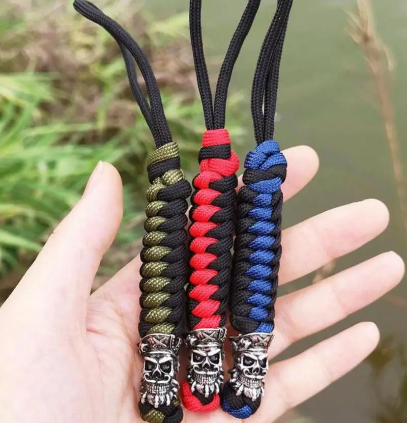 1Pc Handmade Woven Durable Skull Bead Decorative Paracord Hanging Pendant Keychains Outdoor Camping Porable Small Tool