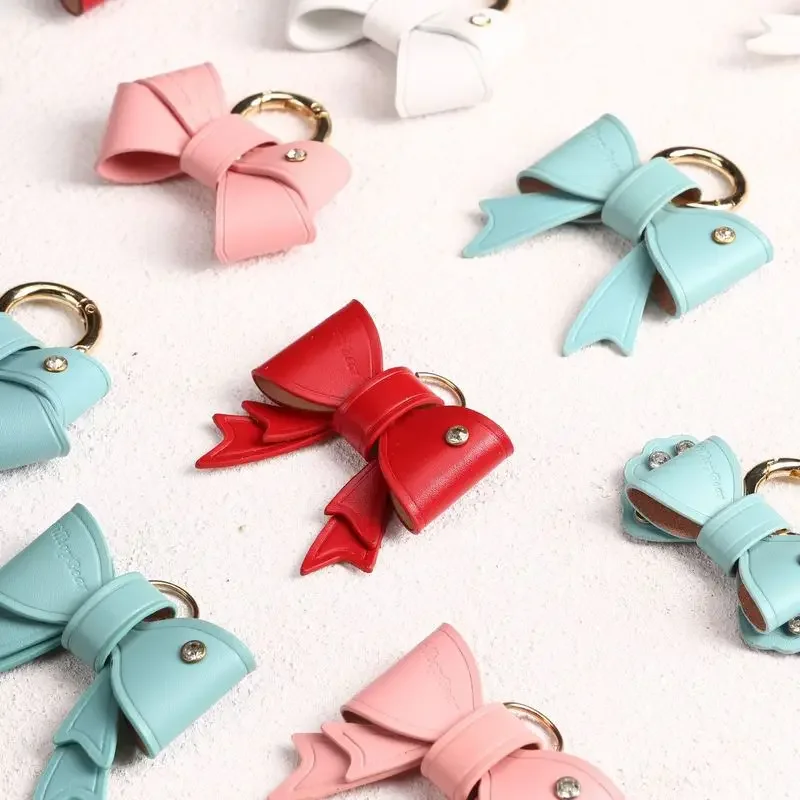Nowy ręcznie robiony brelok Kawaii z kokardą uroczy skórzany brelok Unisex dla przyjaciela luksusowy Design kokarda brelok do kluczyków samochodowych akcesoria
