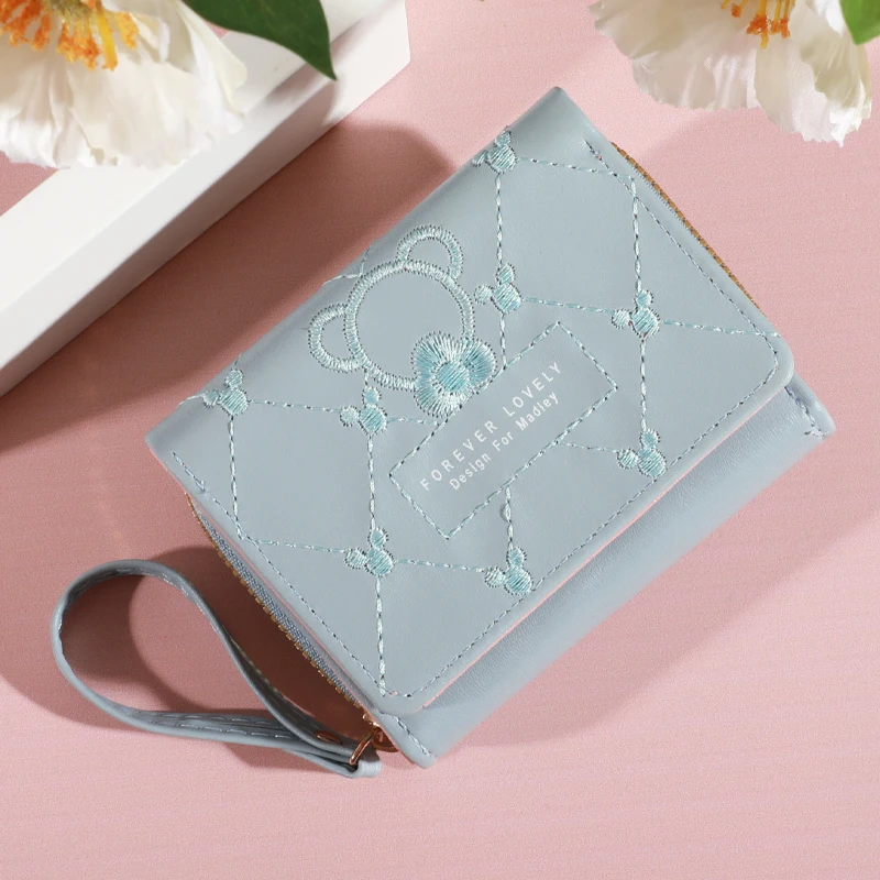 Neue dreifach gefaltete Damen brieftasche mit Armband verschluss, mehreren Reiß verschluss taschen und lässigem Kreditkarten halter für Frauen