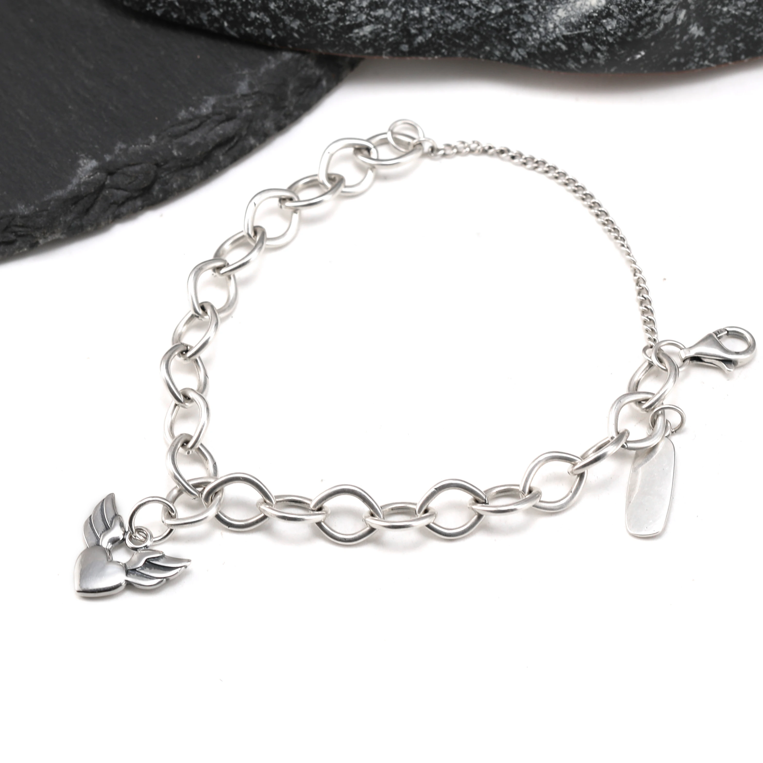 

Genuine 925 sterling silver James Avery Forged Link Charm Bracelet paired with the Let love soar pendant