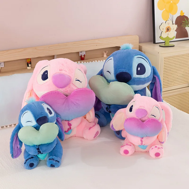 Peluche ripiene Kawaii simpatico cartone animato punto che abbraccia il cuore bambola angelo riempimento regalo di compleanno per bambini gioco di redenzione del premio di peluche