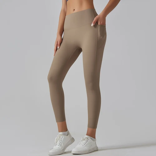 Imagen 2 del producto Mallas deportivas de sensación desnuda con bolsillo para mujer, pantalones de Yoga para correr, Leggings de energía de cintura alta, Leggings de gimnasio para niña