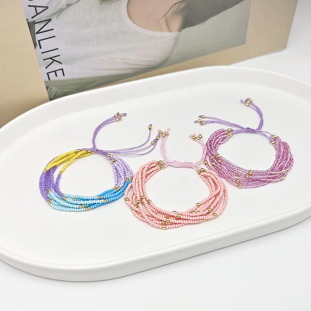

ZGMXR Rice bead bracelet Hand weaving Multiple layers Gradation color Bohemia Adjustable Woman Fashion Simple Beaded bracelet