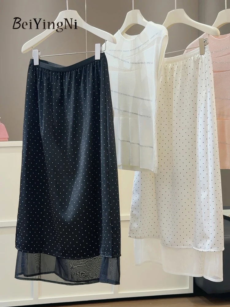 Saia Midi Feminina Beiyingni com Estampa de Bolinhas Pretas, Elegante Estilo Francês, Saia Godê de Cetim para o Dia a Dia, Coleção Verão 2026, Saia Feminina Branca com Patchwork