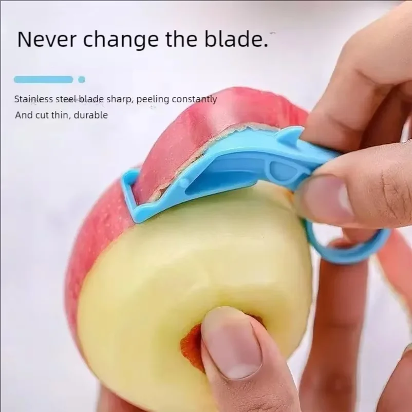 Fruit peeler for peeling oranges and apples. Hand-powered fruit peeling device