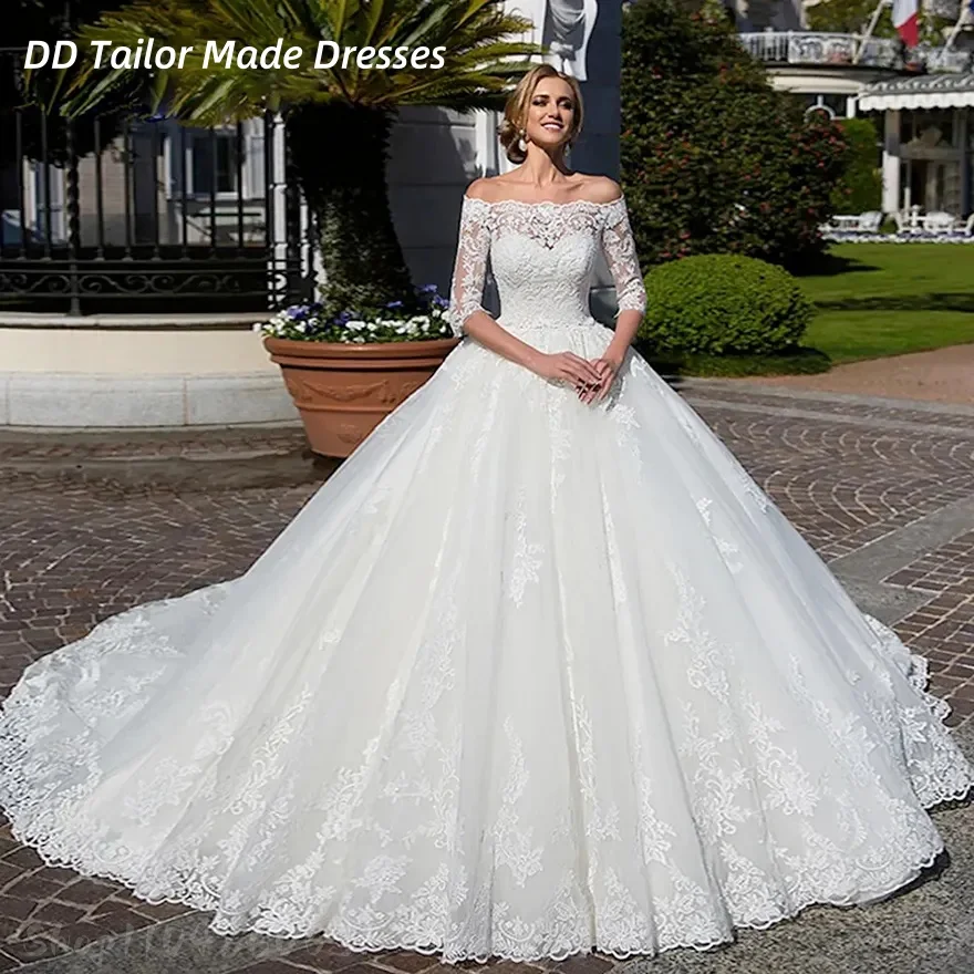 Abito da sposa cappella di lusso per la sposa con spalle scoperte mezze maniche applicazioni in pizzo abiti da sposa in tulle avorio personalizzati