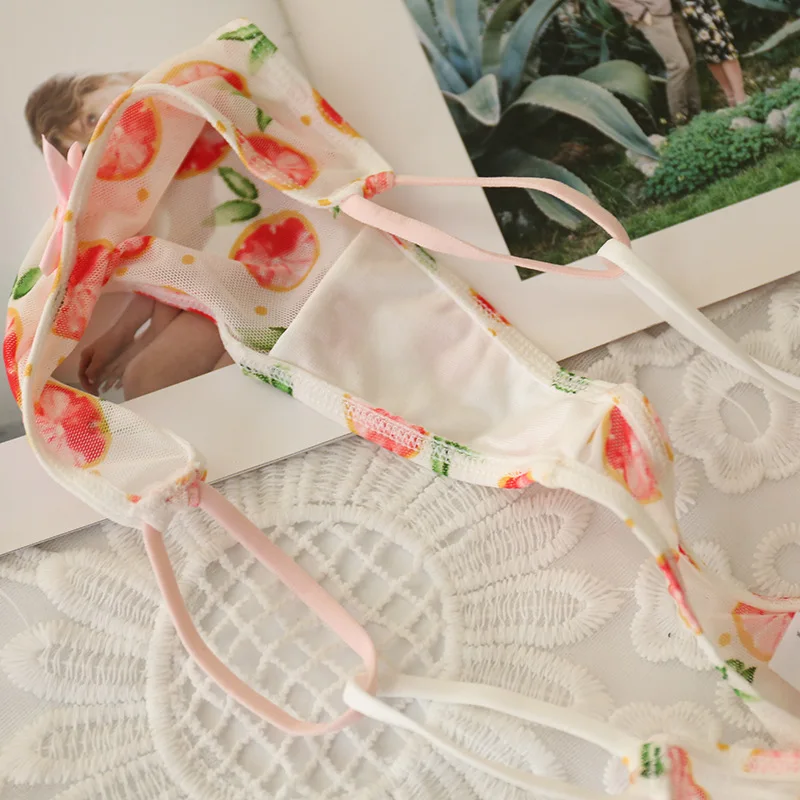 유럽과 미국의 메쉬 끈 T 바지 섹시한 투명 레오파드 인쇄 핑크 귀여운 여성 속옷 낮은 허리 소녀