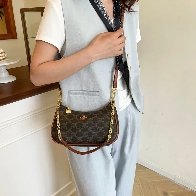 

Women's Popular Handbag with Adjustable Crossbody Strap Leather By Famous Luxury Brand Elegant Modern