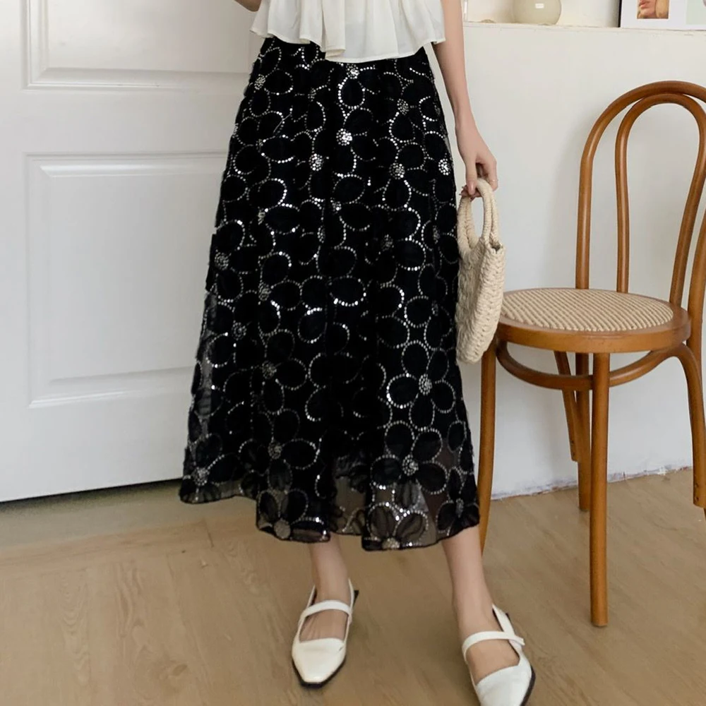 High-class temperament celebrity hollow sequined mesh skirt women's big pendulum A-shaped  medium and long small skirt