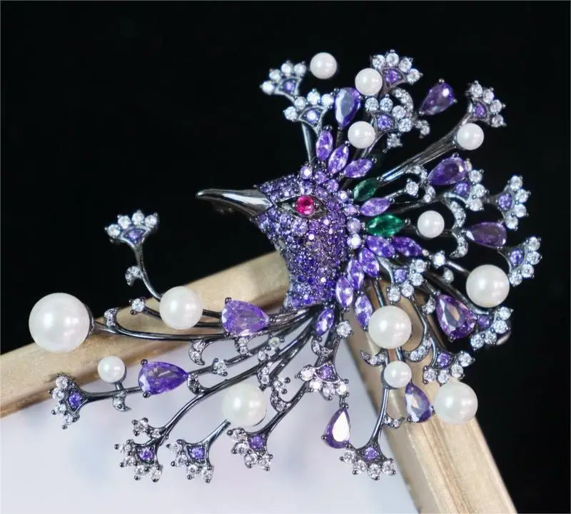 

Ruihe New Purple Phoenix Bird Brooches 5A Cubic Zircona Gemstones with Fresh Water Pearl or Shell Pearl Jewelry Gift Christmas