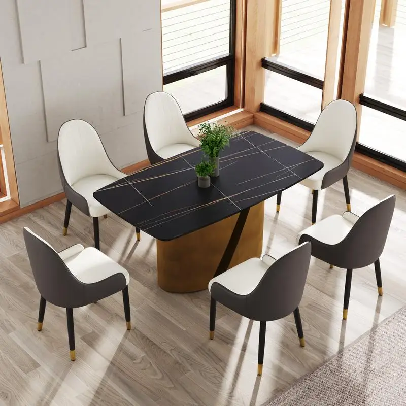 طاولة طعام حديثة من الحجر الاصطناعي المنحني باللون الأسود مع أرجل حديدية برونزية - مقاعد تتسع لـ 6-8 أشخاص #1