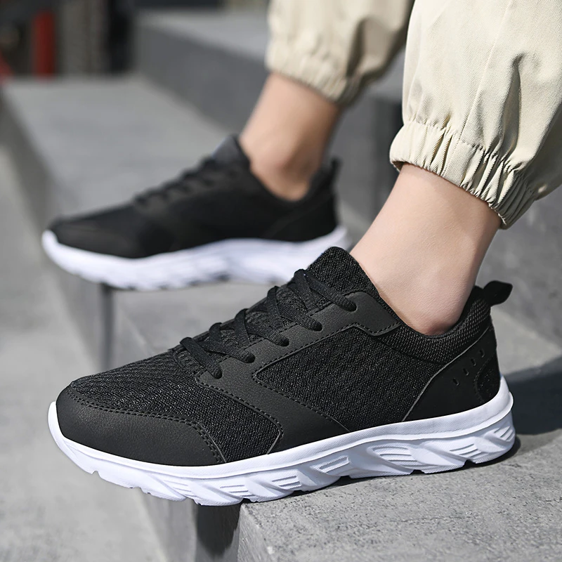 

Unisex Breathable Knit Running Shoes Lightweight Cushioned Sport Sneakers for Men And Women Casual Gym Athletic Trainers for Jog