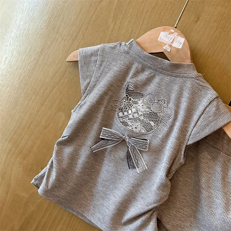 Girls' western-style high-end bow short sleeved shirt, summer new style, children's fart curtain micro pull pants two-piece set