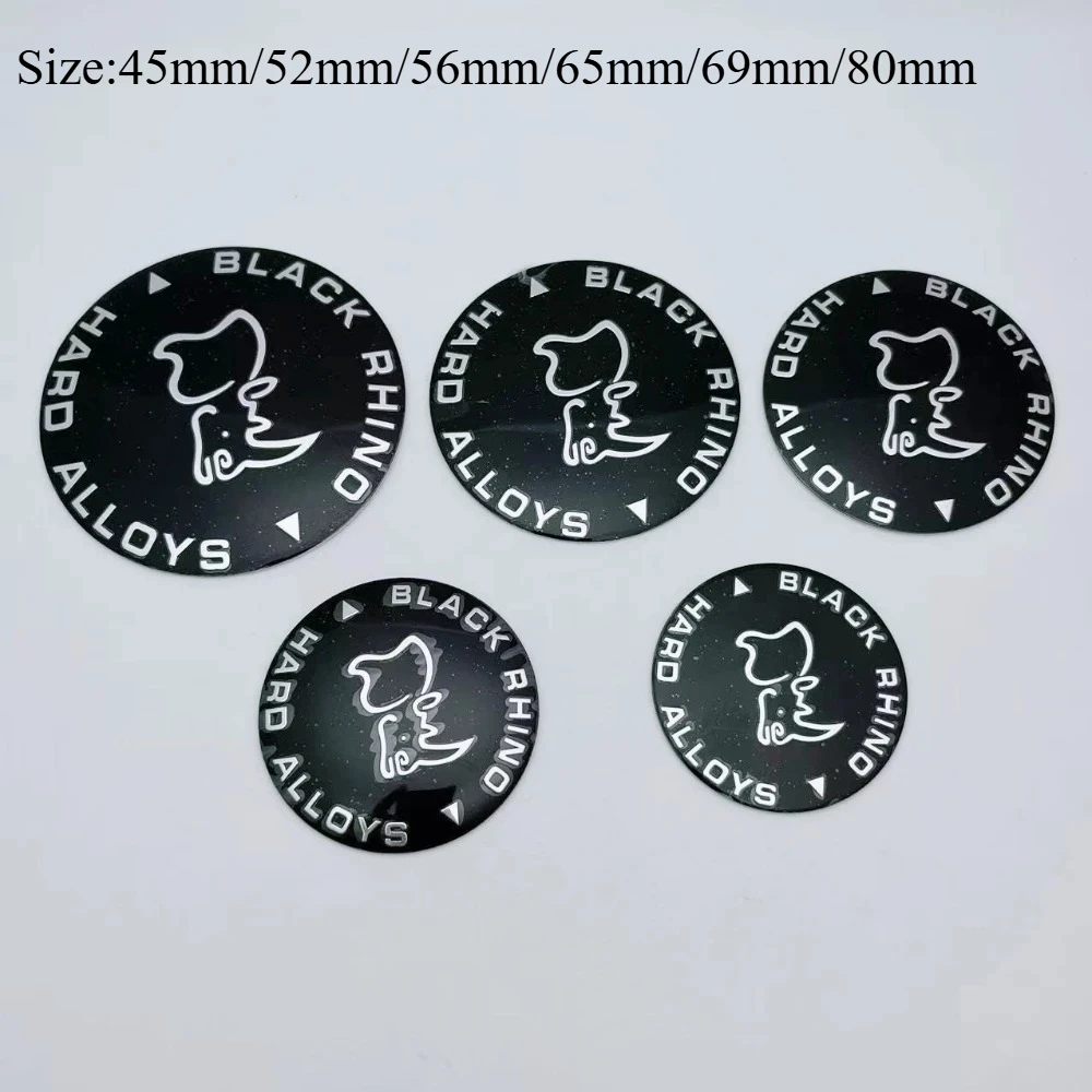 4pcs Black Rhnio Logo Emblem Car Wheel Stickers 45mm 52mm 56mm 65mm 69mm 80mm Replace Car Accessories Wheel Center Cap Badge