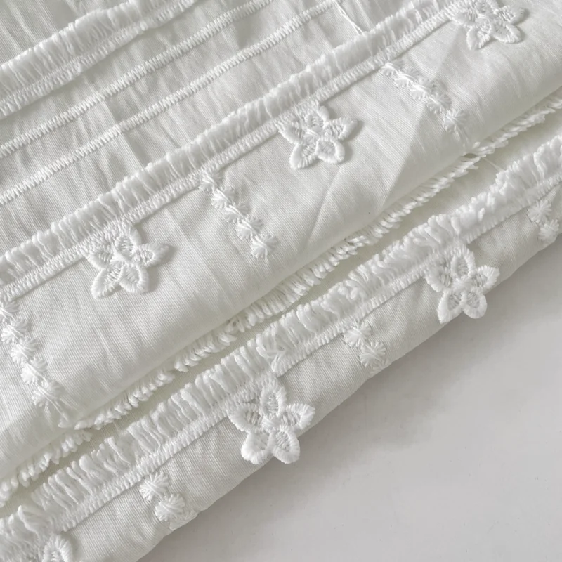 

White embroidered tassels polyester fabric,for dress, tablecloth, diy clothing fabric