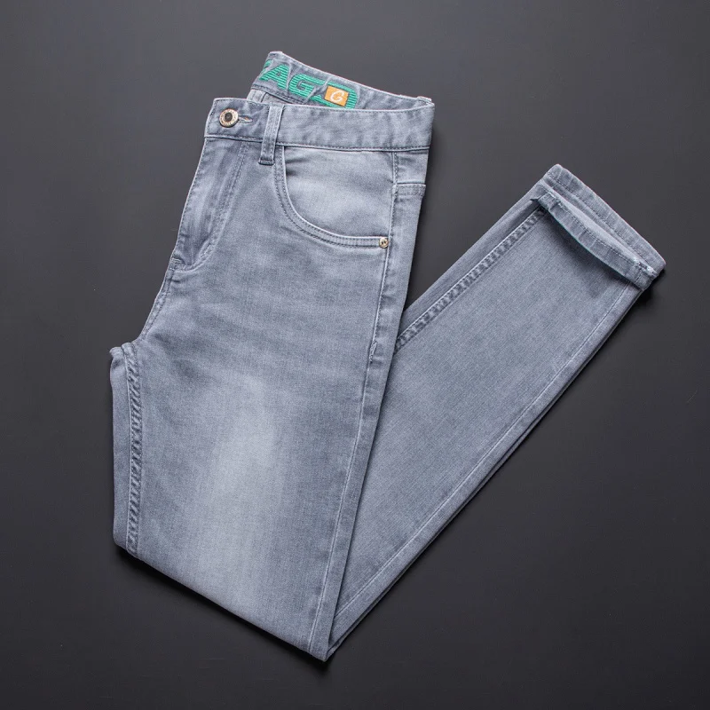กางเกงยีนส์ผู้ชายอินเทรนด์ระดับไฮเอนด์ 2025 ฤดูร้อนกางเกงยีนส์ยืดบางแฟชั่นสลิมฟิตกางเกงสีเทาเท้าเล็ก