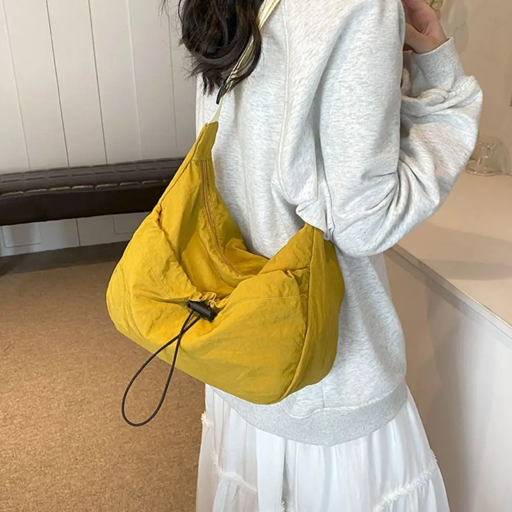 

Solid Color Nylon Shoulder Bag Adjustable Shoulder Straps Korean Style Drawstring Bucket Bag Nylon Large Capacity