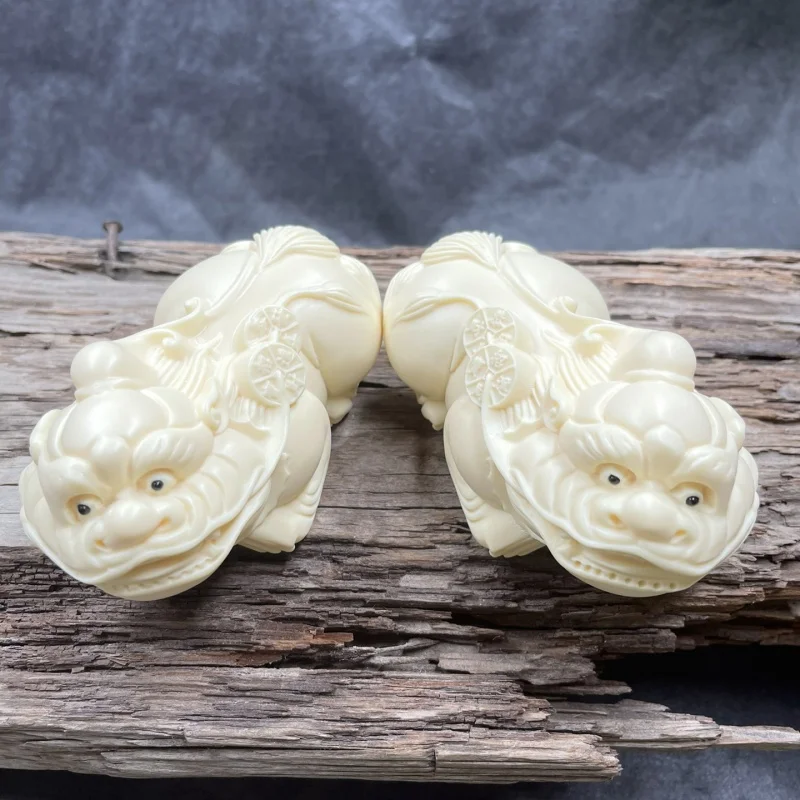 

New Product Ivory Nut Carved Money Drawing Pi Xiu Decoration Car Decoration Desktop Decoration Tea Ornaments Handheld Artsy Obje