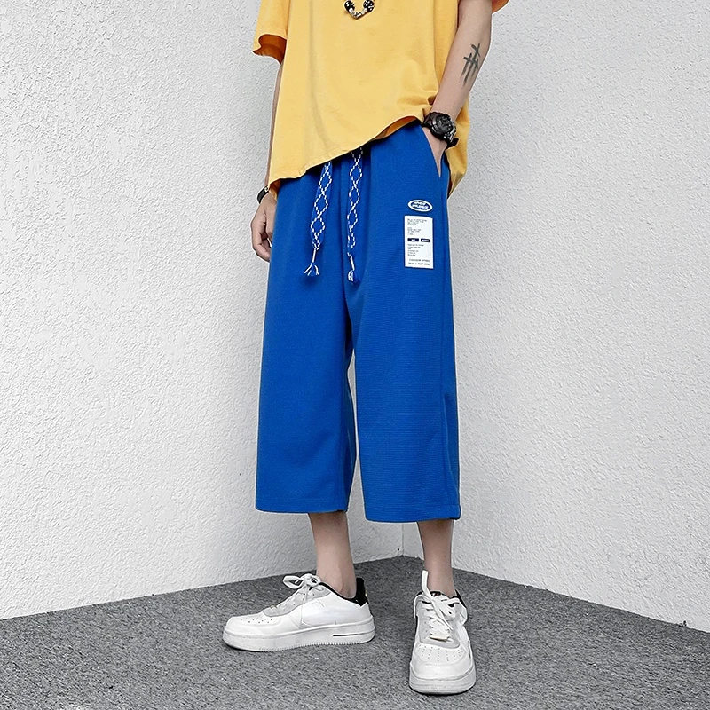 

Summer New Casual Pants Mens Elastic Waist Wide Leg Trousers Solid Pockets Loose Cropped Pants Plus Size 5XL-S