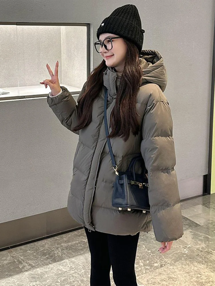 

Теплая женская удлиненная куртка-пуховик с капюшоном, утепленная хлопком, в корейском стиле, свободного кроя, на молнии