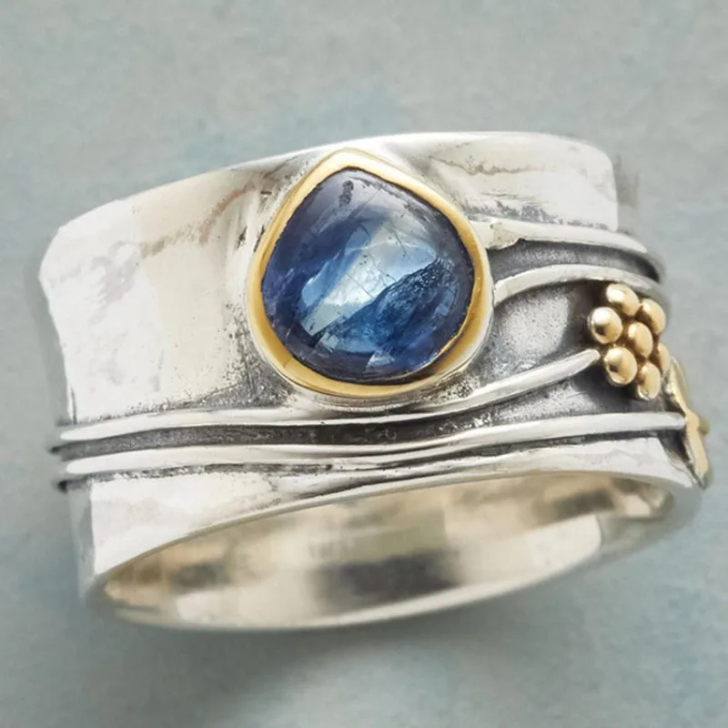 

New, simple sea blue water drop gemstone jewelry, European and American leaf flower two-color ring.