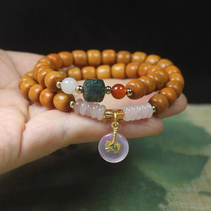 

Sandalwood vintage-style double-layer beaded bracelet with pink peace pendant, women's collectible prayer beads and Buddhist bea