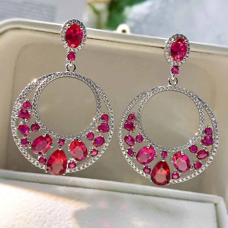 Highcarbon diamond inlaid with water droplets 6 * 9 pigeon blood red European and American luxury style ice flower s925 earrings