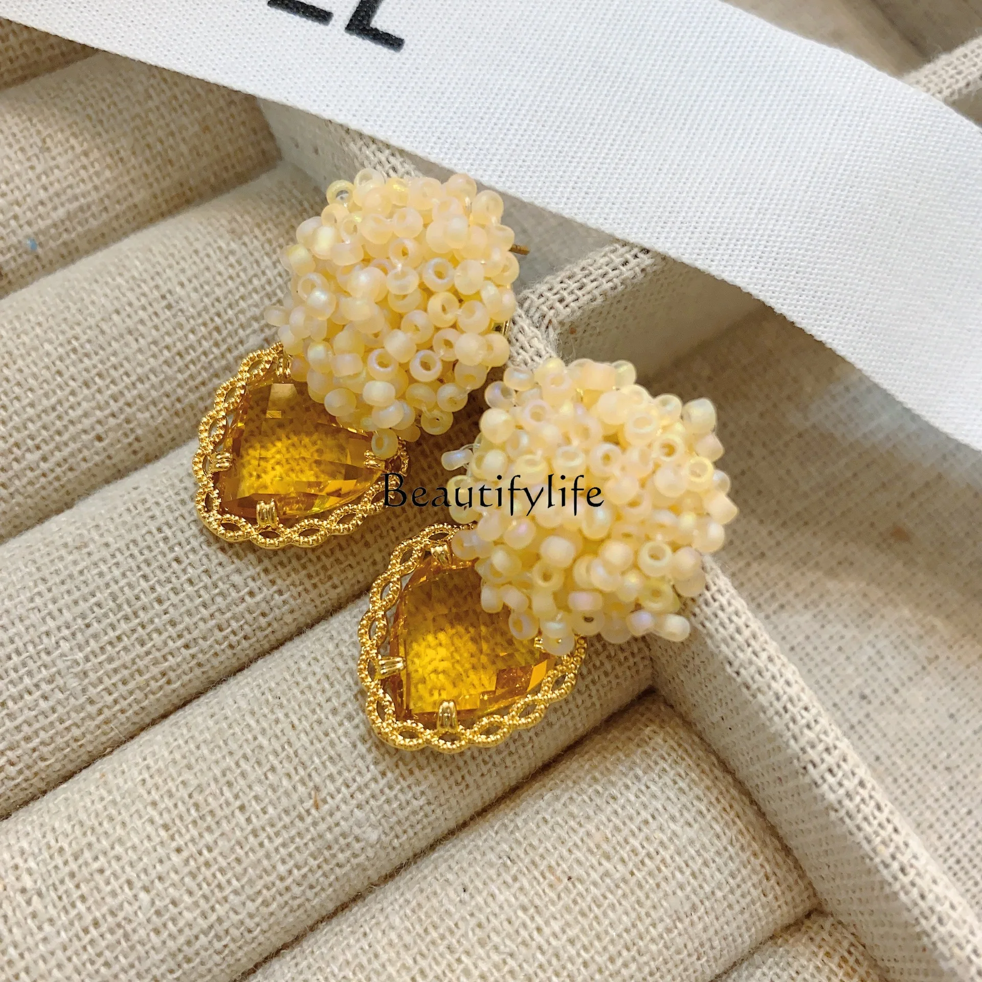 Handmade beaded flower stud earrings, small fresh and gentle wind yellow love earrings