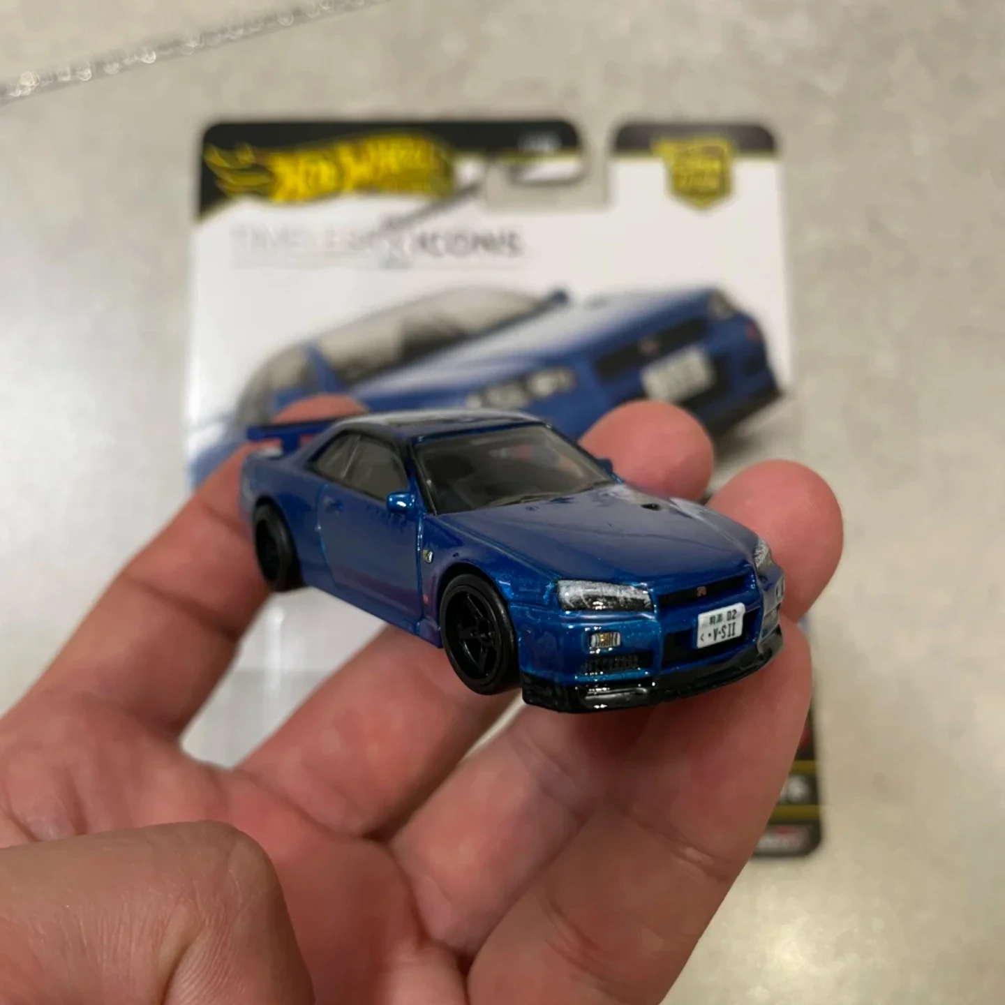 Hot Wheels Gold Label Nissan GT-R V-Spec II Icons Series Diecast Metal Base & Rubber Tires 1:64 Scale Collectible Toy Gift