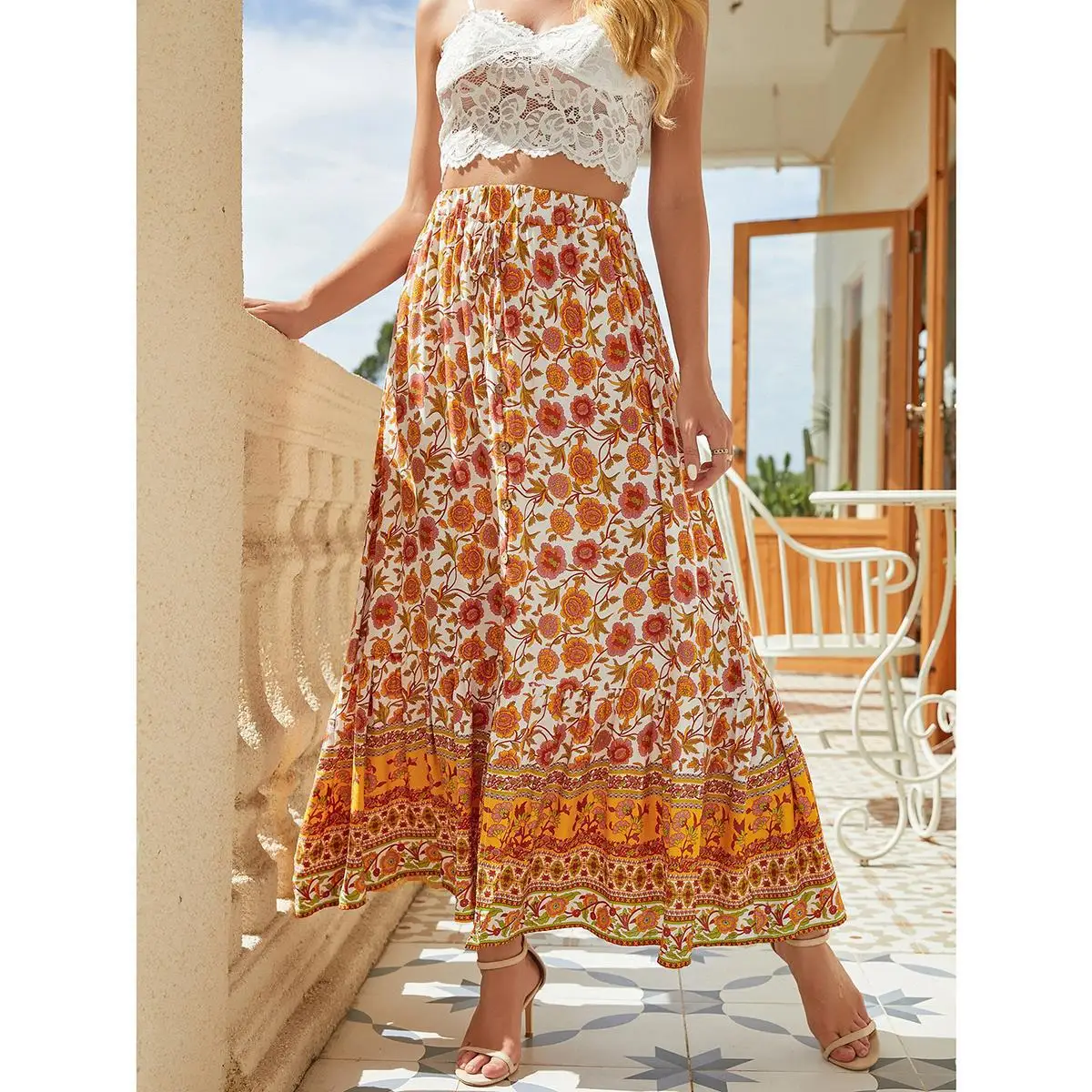 تنورة نسائية عصرية نصف طول عالية الخصر من القطن مطبوعة بأزرار وحاشية غير متماثلة على الطراز البوهيمي لقضاء العطلات على الشاطئ