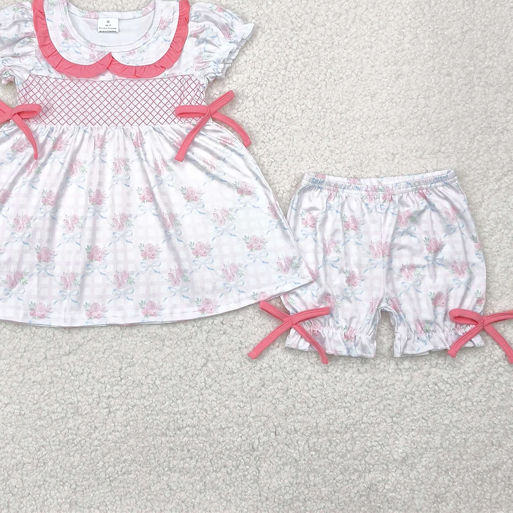 طقم شورت مكشكش بأقواس زهور وردية للفتيات الصغيرات بأكمام قصيرة مع فيونكة منقوشة للفتيات الصغيرات
