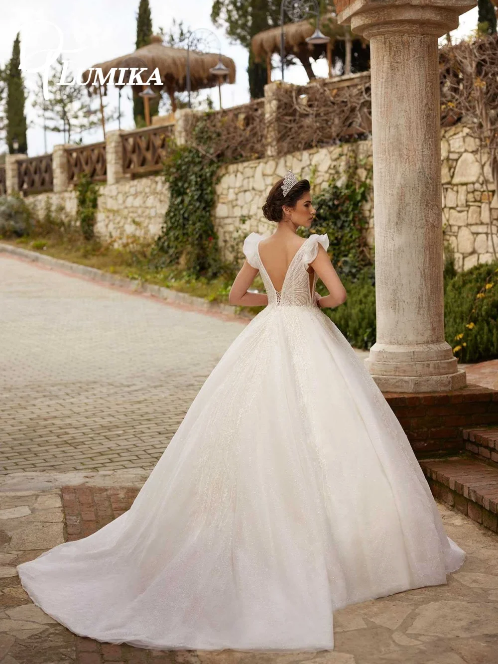 Vestido de novia Sexy con escote en V profundo, encantador vestido de novia sin mangas, elegante vestido de novia hasta el suelo con apliques de corte en A personalizado